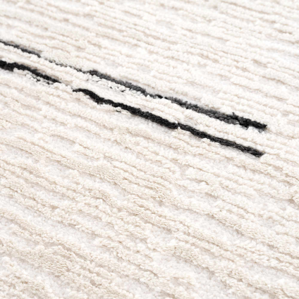 Riad Black Striped White Rug with Tassels